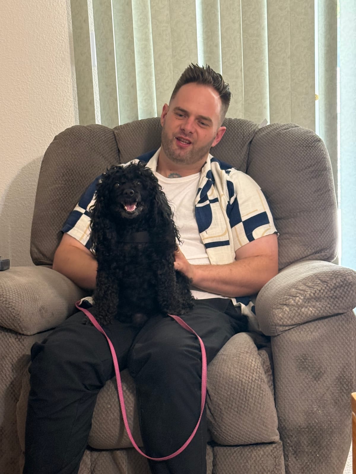 Chris Taylor and the family dog in Kingman, Arizona